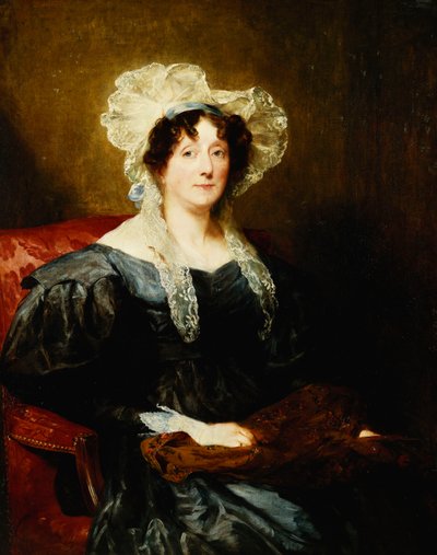 Retrato de una dama, sentada a media longitud, con un vestido azul oscuro y un sombrero de encaje blanco con un lazo azul, sosteniendo una labor de aguja de Margaret Sarah Carpenter