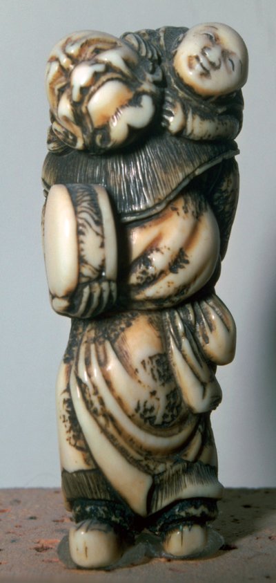 Netsuke japonés de un bailarín chino y un niño, siglo XVIII de Masahira