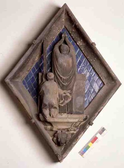 La Eucaristía, azulejo en relieve del Campanario de Maso di Banco