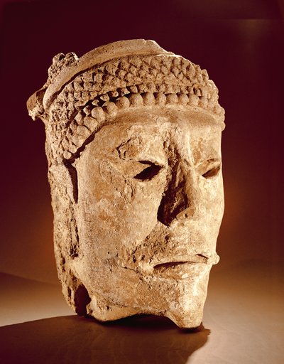 Cabeza cortada de una pared en Comalcalco, Tabasco, Maya Clásico de Mayan