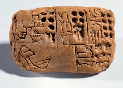 Mesopotamia: tablilla de tierra cruda con inscripción cuneiforme. Región de Sumer. 3300 a.C. París, Museo del Louvre de Mesopotamian School