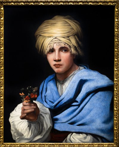Niño con turbante sosteniendo un ramo de flores de Michael Sweerts