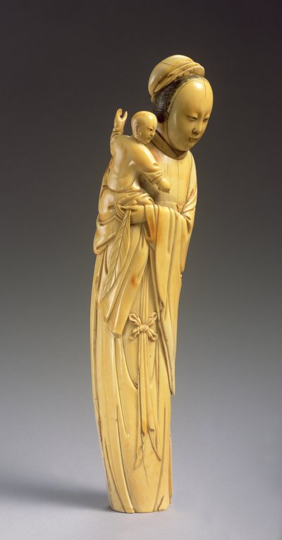 Figura de Guanyin sosteniendo a un niño (marfil tallado) de Ming Dynasty Chinese School