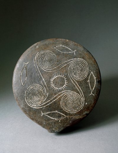 Arte minoico: disco circular de Naxos en terracota. Civilización minoica. 2400-2000 a.C. Atenas, Museo Arqueológico Nacional de Minoan