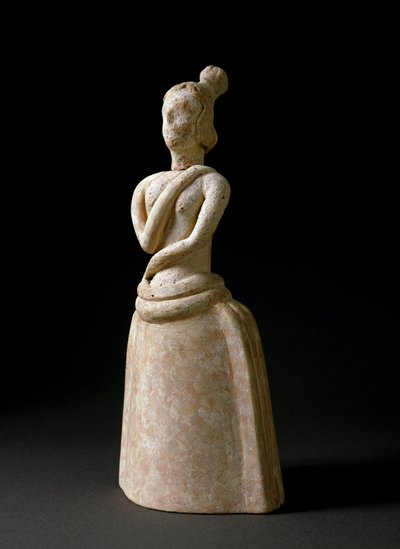 Arte minoico: figurilla de terracota de una mujer en actitud de adoración de Minoan