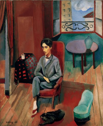 Jean Cocteau sentado en su estudio de Moise Kisling