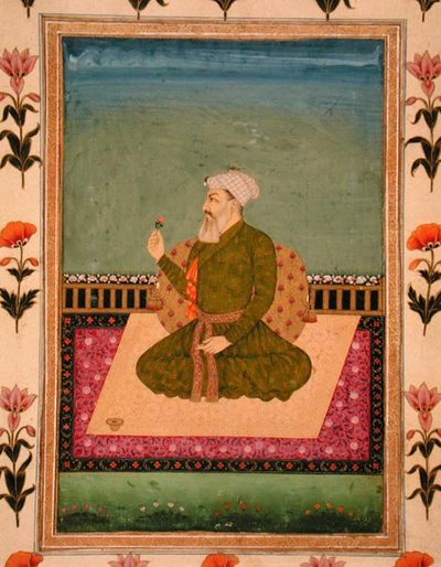 Un gobernante sentado en una alfombra o terraza, sosteniendo una flor, del Pequeño Álbum Clive de Mughal School