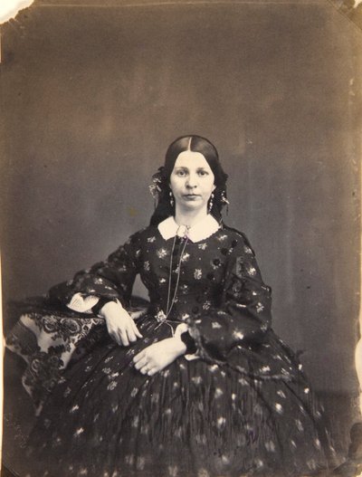 Mujer joven sentada de Oliver H. Willard