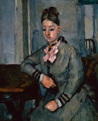 Madame Cézanne apoyada en una mesa, c.1873 de Paul Cézanne