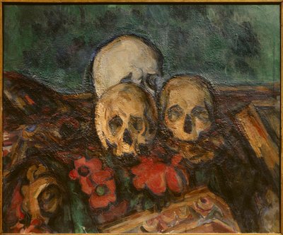 Tres cráneos sobre una alfombra oriental de Paul Cézanne