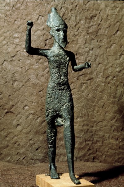 Fenicia: figurilla de un dios en bronce. Encontrada en el mar cerca de Selinunte, Sicilia. Siglo XIV-XIII a.C. Palermo, Museo Arqueológico Nacional de Phoenician