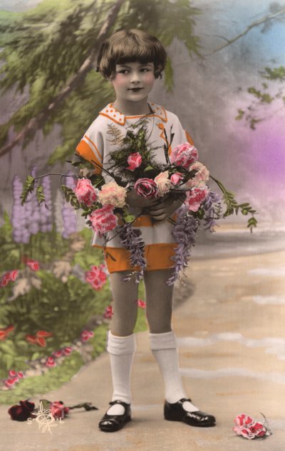 Joven francés sosteniendo rosas de Photographer French