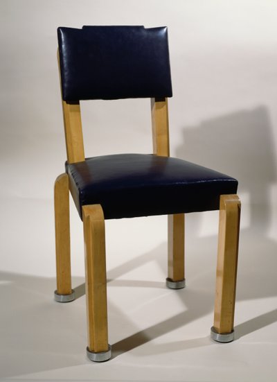 Silla, por Pierre-Emile Legrain, en cuero azul y madera de sicomoro, estilo Art Deco. Francia, siglo XX. de Pierre E. Legrain