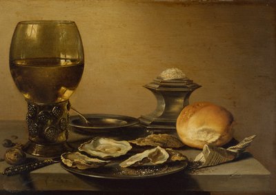 Un bodegón de desayuno con ostras, pan salado y nueces de Pieter Claesz