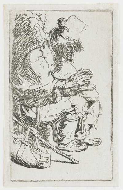 Un mendigo calentándose las manos de Rembrandt van Rijn