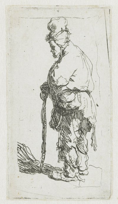 Mendigo apoyado en un bastón, mirando hacia la izquierda de Rembrandt van Rijn