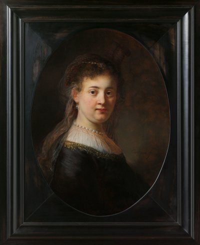Mujer joven con traje de fantasía de Rembrandt van Rijn