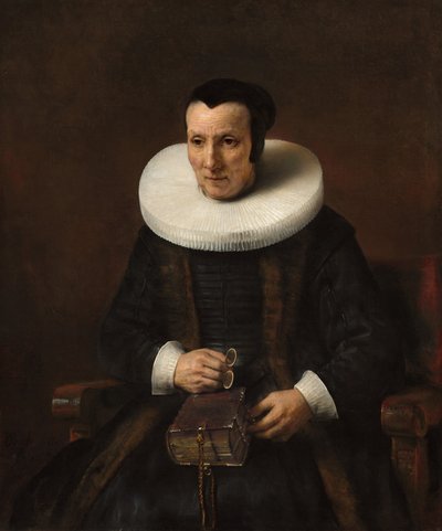 Una Anciana con un Libro de Rembrandt van Rijn and Workshop