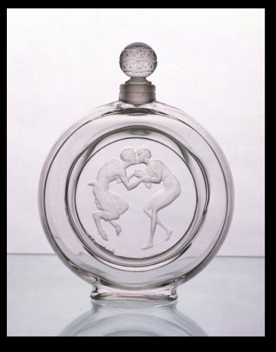 Le Baiser du Faune, botella de perfume de vidrio claro para Molinard por Lalique de Rene Jules Lalique