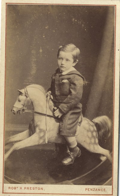 Niño sentado en un caballo de juguete, 1870s de Robert H. Preston