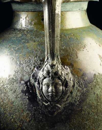 Base de un asa de jarra de vino, que representa la cabeza de Baco, del sitio romano en Newstead, Melrose, finales del siglo I d.C. (detalle) de Roman