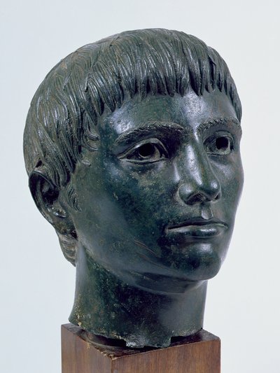Cabeza de un niño (bronce) de Roman