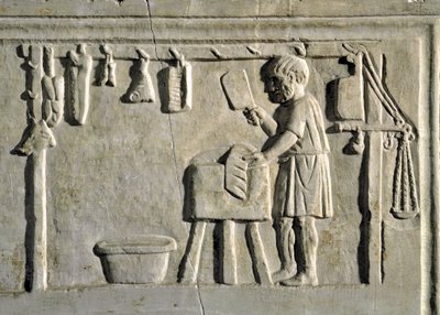 Arte romano: un carnicero en su tienda (detalle) de Roman