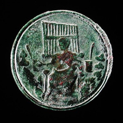 Moneda romana que representa un órgano de Roman