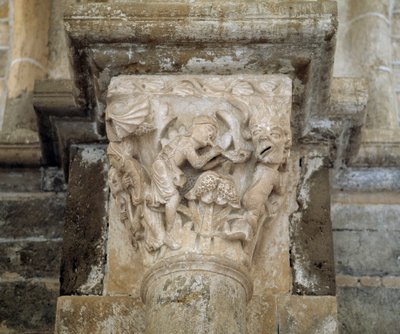 Un músico y un demonio simbolizando la lujuria (capitel tallado) de Romanesque
