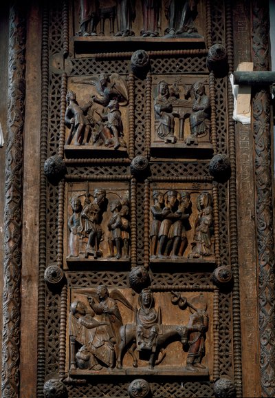 Arte románico: puerta de madera de mediados del siglo XII de la Iglesia de Santa María del Capitolio en Colonia, Alemania (Sankt Maria im Kapitol, Köln). Escenas que representan el anuncio a los pastores, la natividad, la adoración de los magos y la de Romanesque