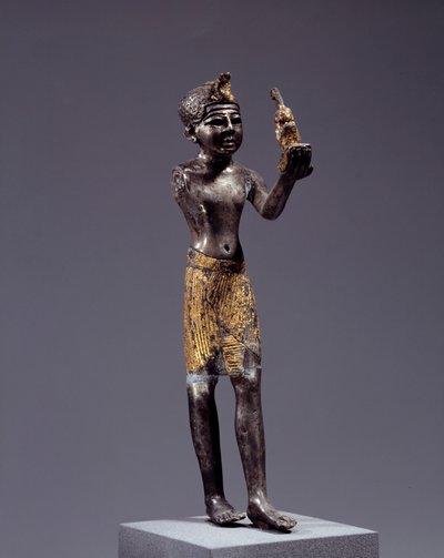 Antigüedad egipcia: estatuilla del rey (¿Sethi I?) haciendo la ofrenda de Maat. Escultura de plata y oro. Reinado de Sethi. París, Museo del Louvre de School Egyptian
