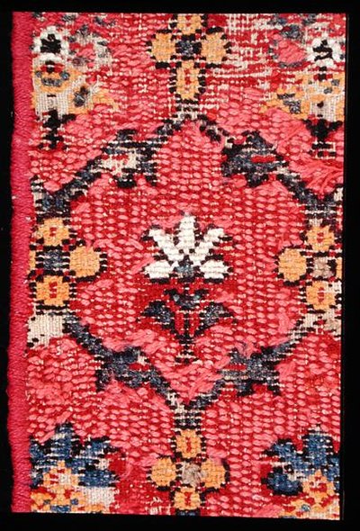 Detalle de una alfombra anudada a mano, posiblemente hecha en Wilton, finales del siglo XVIII o principios del XIX de School English