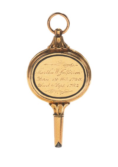 Llave de reloj grabada memento mori, con un mechón de cabello de Martha Wayles Jefferson, francés o inglés, finales del siglo XVIII - principios del siglo XIX de School European