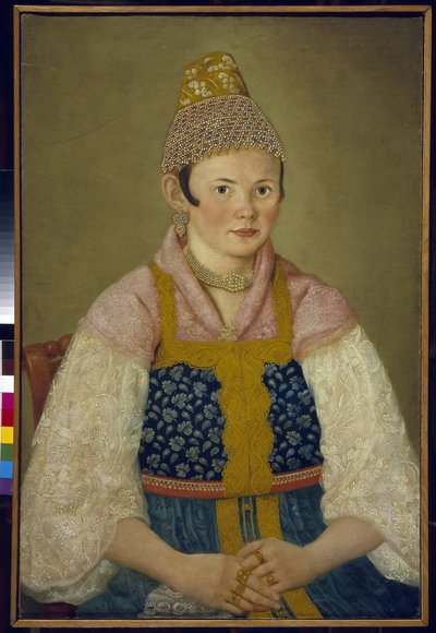 Retrato de la esposa de un comerciante, tocado del tradicional kokoshnik. (Retrato de una mujer comerciante en Kokoshnik Kabluchok). También viste el traje tradicional ruso (sarafane) decorado con bordados, con una blusa con mangas de encaje, su tocado de School Russian