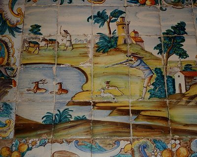 Azulejos que representan a un cazador disparando a un ciervo de School Spanish
