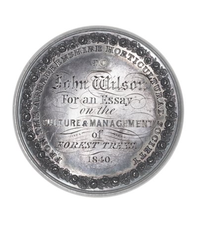 Premio de Plata de la Sociedad Hortícola de Aberdeenshire otorgado a John Wilson por un ensayo sobre el cultivo y manejo de árboles forestales de Scottish School