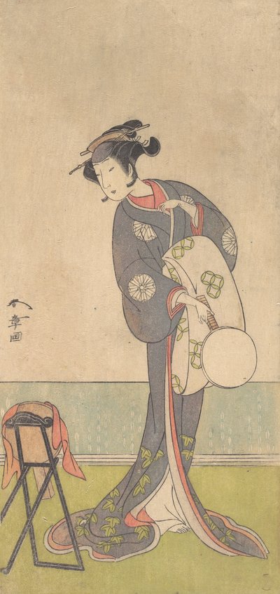 El primer Nakamura Tomijuro como una Oiran de pie en una habitación de Shunsho