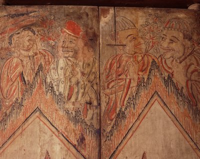 Detalle de una puerta con figuras de extranjeros de Siamese School