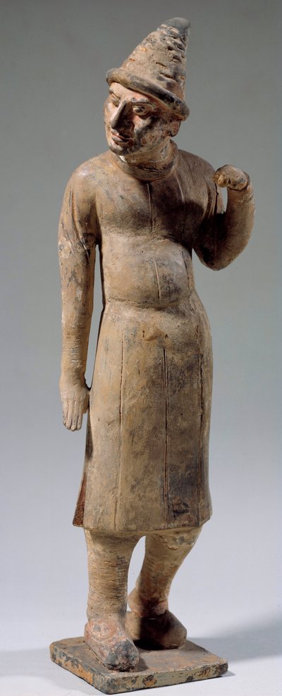 Arte chino: estatuilla de terracota sogdiana, bárbara con sombrero puntiagudo llevando seda (del actual Uzbekistán) de Sogdian Sogdian