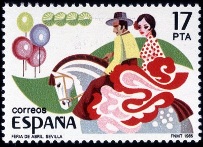 La Feria de Sevilla: pareja en traje folclórico a caballo - sello español de Spanish School
