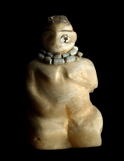 Baja Mesopotamia, Irak, arte sumerio: estatuilla de alabastro de una mujer arrodillada del sitio de Tell es-sawwan. 3000 a.C. Dim. 9.4 cm Bagdad, Museo Nacional de Irak de Sumerian Sumerian
