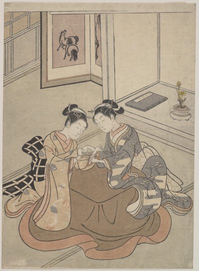 Dos mujeres jóvenes sentadas junto a un kotatsu jugando a la cuerda de Suzuki Harunobu