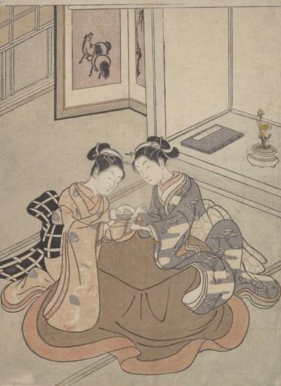 Dos mujeres jóvenes sentadas junto a un kotatsu jugando a la cuerda, ca. 1765 de Suzuki Harunobu