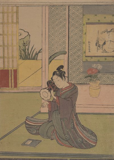 Joven tocando un tambor Noh de Suzuki Harunobu