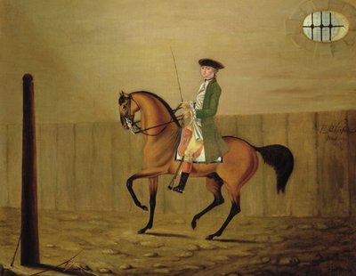 Caballero en un caballo bayo en una escuela de equitación de Thomas Parkinson