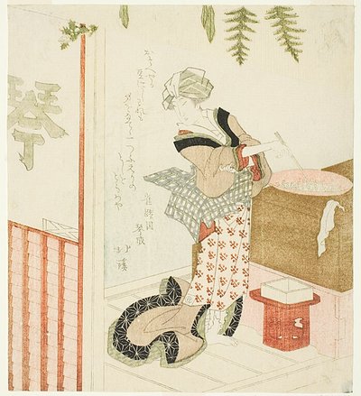 Mujer cocinando alubias en la tienda de Totoya Hokkei