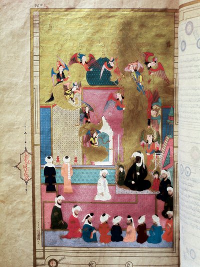 El Profeta Mahoma (Muhammad) (570-632) (rostro cubierto) durante el Mirac, su ascenso al séptimo cielo. Miniatura del manuscrito “Zubdat al-Tawarikh” por el historiador Seyyid Loqman Ashuri bajo el reinado de Murad III de Turkish School