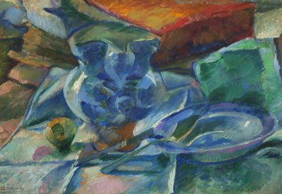 Naturaleza muerta de loza, cubiertos y frutas de Umberto Boccioni