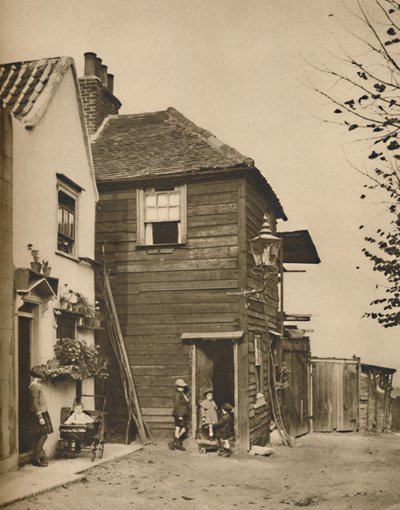 Casas antiguas en Highgate desde cuyas puertas los aldeanos veían pasar los carruajes, c. 1935 de Unbekannt