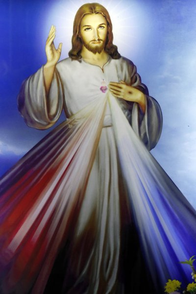 Tienda que vende artículos religiosos cristianos. Jesús misericordioso, confío en ti. Ciudad Ho Chi Minh. Vietnam de Unbekannt